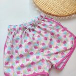 Beach shorts tropical fushia